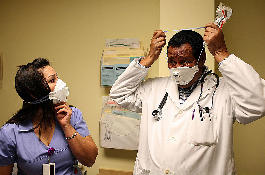 Health Clinic Workers Train Staff For Dealing With Swine Flu Testing