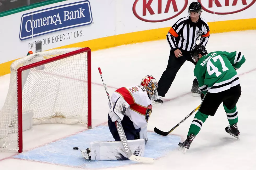 Dallas Stars Player Borrows a Jersey From a Fan in the Stands During a Game